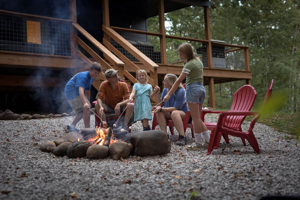 Roper Family Enjoys a Campfire Roper Family enjoys a campfire on their rural property in Sparta, Tennessee