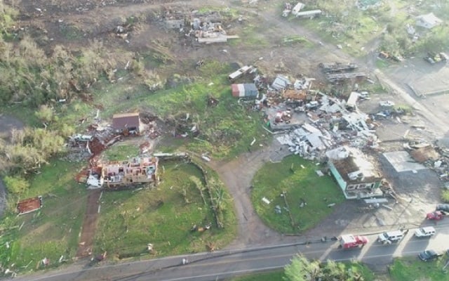 Aerial view of damage from a tornado.